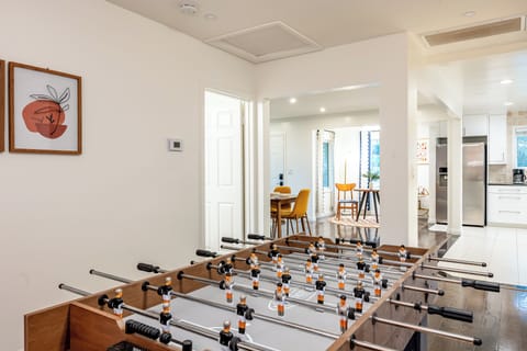 Get competitive and show off your skills at the foosball table—game on!