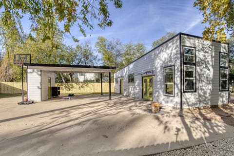Outdoor Retreat: Enjoy the spacious carport and relaxing outdoor space for gatherings and play!