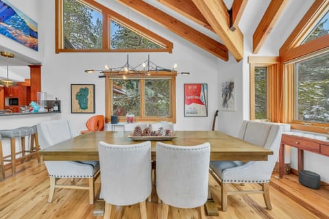 Dining Area: Seating for 6 at the dining table, 4 additional barstools at the kitchen peninsula
