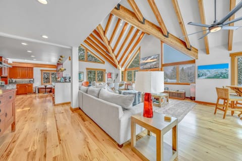 Living Room 1: Gas fireplace, 75” TCL Smart TV, central heating, no A/C