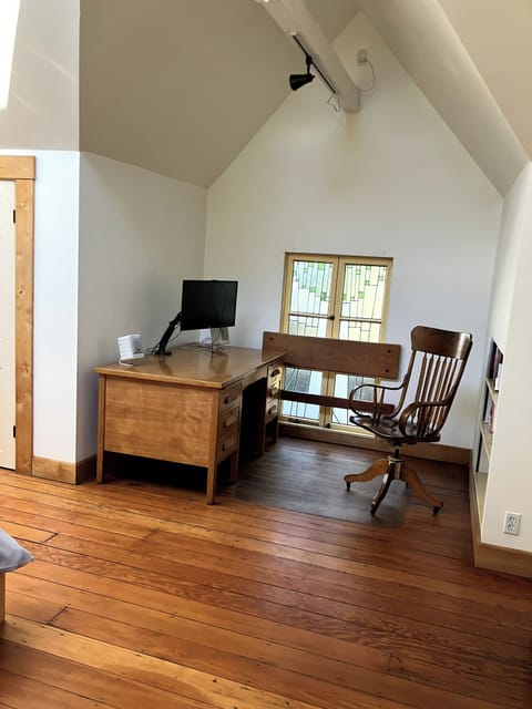 Large Bedroom with desk and computer monitor