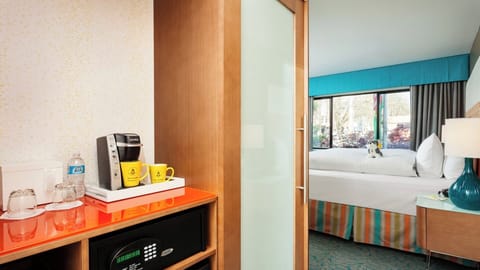 Unit with 1 Queen bed. Exact unit will be assigned upon arrival. Views, colors, and decor may vary.