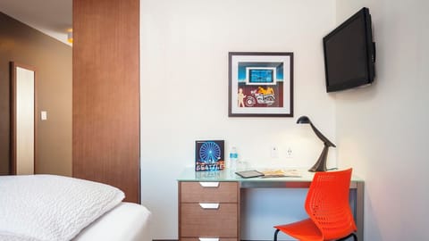 Unit with 1 Queen bed. Exact unit will be assigned upon arrival. Views, colors, and decor may vary.