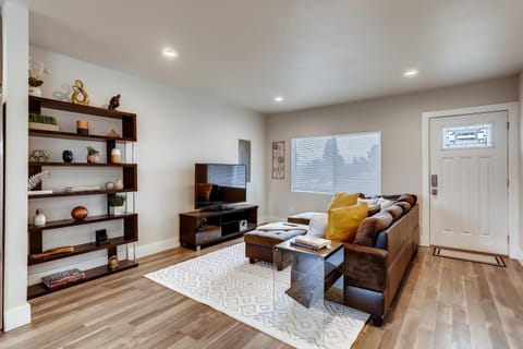 Newly remodeled Home! Living room with 55" UHD TV! Disney+ and Netflix available