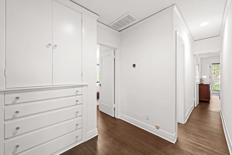 Fully stocked linen closet with extra sheets, blankets, toiletries and more