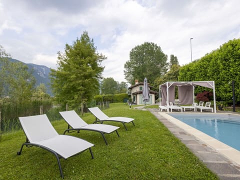 Outdoor Furniture, Swimming Pool, Furniture, Sunlounger, Garden, Resort, Shade, Chair, Leisure, Landscaping