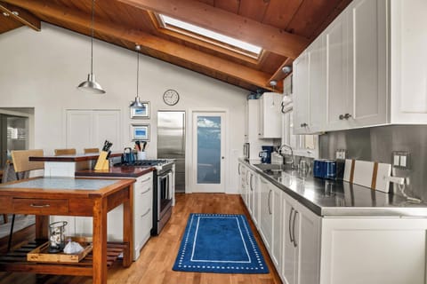 The kitchen and dining spaces flow seamlessly together for easy cooking and entertaining