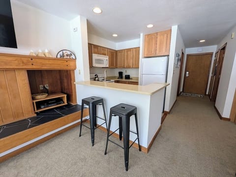 Barstool seating to keep the chef company