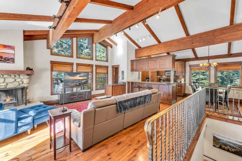 Living room: Wood-burning fireplace (wood not provided), 55" Smart TV, wet bar, radiant heating, no A/C
