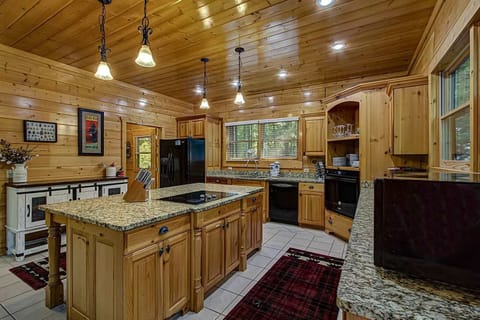 Cook up a storm in this stunning space surrounded by warm wood accents!