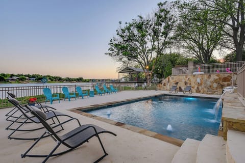 Large lower pool with slide and waterfall