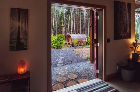 Pathway to the cedar barrel sauna.