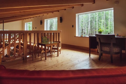 Other loft space is set up with an office area and a double pull-out sofa.