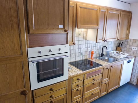 Kitchen, Cabinetry, Kitchen Appliance, Countertop, Major Appliance, Flooring, Wood, Kitchen Stove, Kitchen Sink, Stove