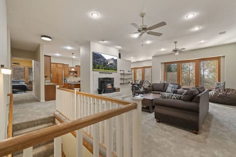 Downstairs offers a bonus room and game area