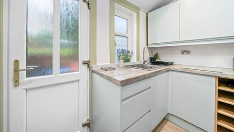 Cook in style! Our modern, fully-equipped kitchen has everything you need for a home-cooked meal