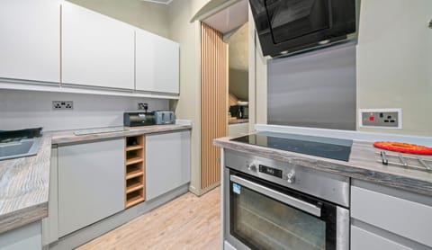 Cook in style! Our modern, fully-equipped kitchen has everything you need for a home-cooked meal