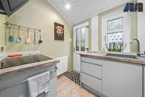 Cook in style! Our modern, fully-equipped kitchen has everything you need for a home-cooked meal