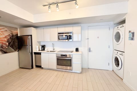 Fully equipped kitchen with all the essentials, perfect for home-cooked meals.