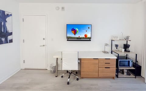 Studio with TV and amenities