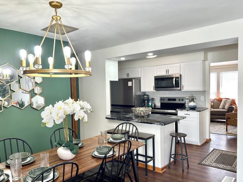The new kitchen opens up to the dining area.