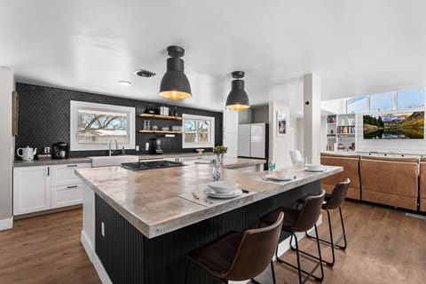 The kitchen island is huge and even comes with additional seating!