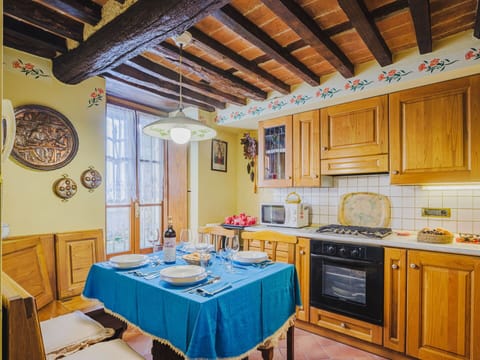 Furniture, Interior Design, Flooring, Wood, Floor, Ceiling, Room, Lighting, Table, Cabinetry