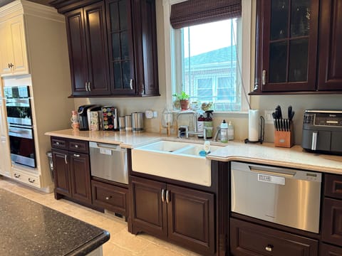 Double sink and double dishwasher. Keurig, coffee machine, Air Fryer & Toaster.