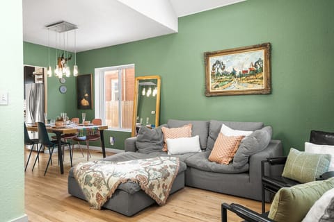 Upon entering you'll be greeted by vaulted ceilings, natural light, and the perfect couch to plop down on after a long day of traveling