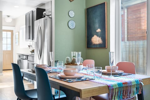 The dining table is in the heart of the main floor