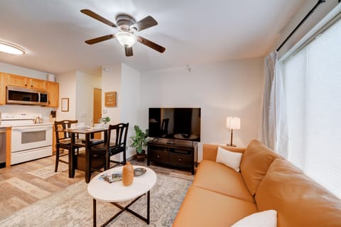 All your needs are just a few steps away, whether you want to cook a wonderful meal, enjoy sitting at the dining room table, or relax on the comfortable leather couch!
