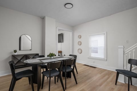 Dining Room: Enjoy stylish meals in a bright space with chic decor and an inviting ambiance!