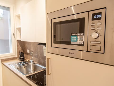 Major Appliance, Kitchen Appliance, Home Appliance, Kitchen, Microwave Oven, Cabinetry, Countertop, Small Appliance, Refrigerator, Drawer