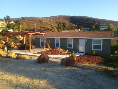 Front of Casa Monte Mar and front patio with fire pit. Amazing views at night!