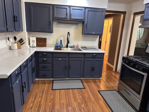 Stocked kitchen with cooking basics, air fryer. 