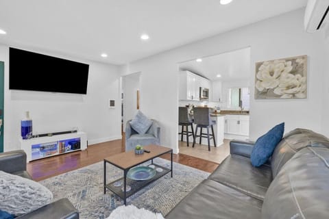 Spacious living room with queen-size sofa bed and Xbox entertainment