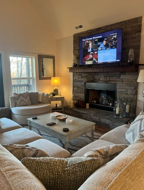 Upstairs Living room equipped with Dish Network.