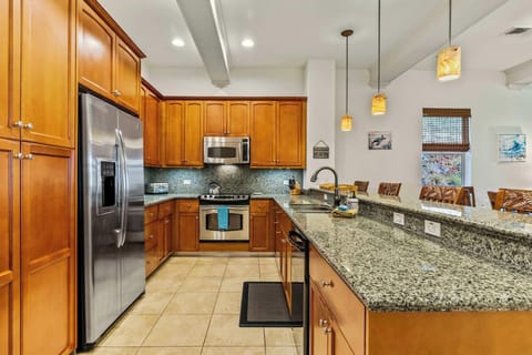 Kitchen with toaster, dishwasher, coffee maker and more