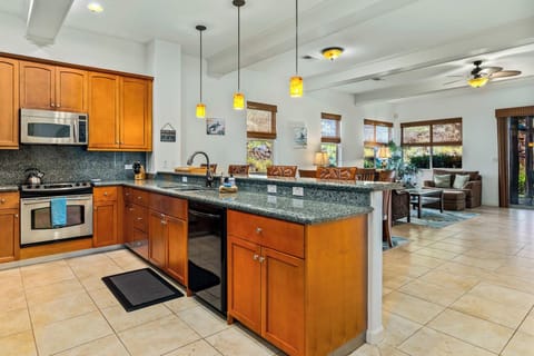 Kitchen with toaster, dishwasher, coffee maker and more