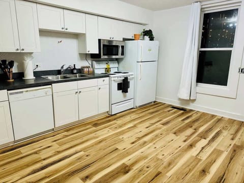 Whether you're making breakfast or cocktails, this sleek kitchen has everything you need. #LuxuryLiving