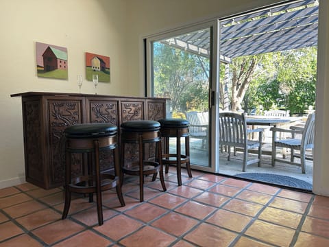 Bar area adjacent to backyard dining