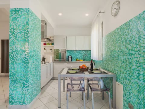 Blue, Flooring, Kitchen, Interior Design, Floor, Countertop, Tile, Mosaic, Natural Material, Paint