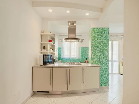 Kitchen, Interior Design, Countertop, Flooring, Cabinetry, Kitchen Appliance, Lighting, Furniture, Ceiling, Floor