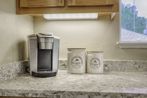 Coffee maker, coffee pods, and sugar for your use