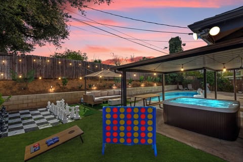 Backyard with Chess Board, Connect 4 and Cornhole Games