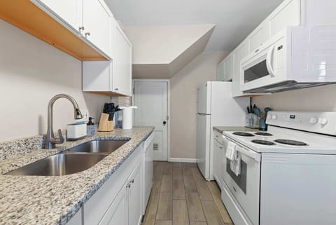 Enjoy every home comfort & abundant space in the sleek kitchen