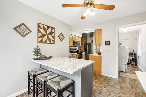 Laundry room off kitchen.
