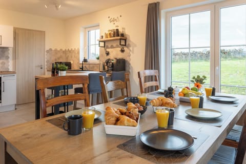 Large dining table with enough space for 6 people + baby