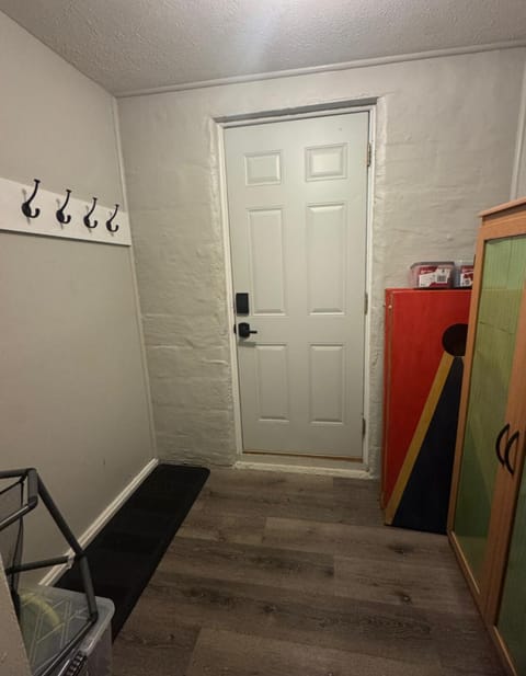 MAIIN LEVEL, MUDROOM; Bean Bag toss with boards, Cabinet with grilling tools, Hot Tub Towels, Instruction and safety regulations for Hot Tub, Gas Fire Table, and Gas Grill... Ball Bin with various balls for backyard play