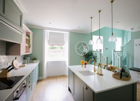 Stables Cottage - a view from the kitchen towards the steps leading to the front door